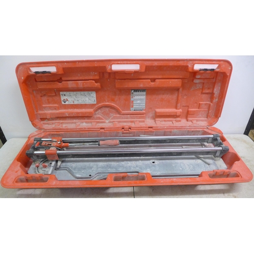 2025 - A Rubi TX-900 tile cutter in a plastic case