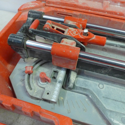 2025 - A Rubi TX-900 tile cutter in a plastic case