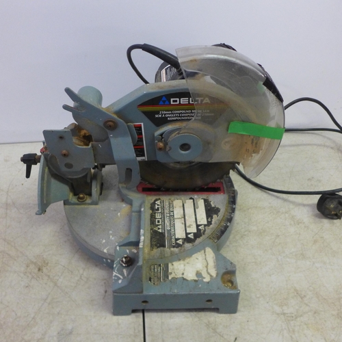 2027 - A Power Base Excel PBXB12MS 230v 1200w compound mitre saw and a Delta 36-040 210mm 230v compound mit... 