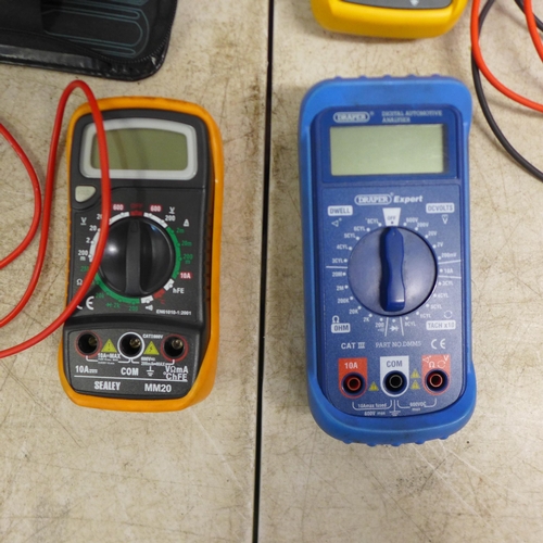 2075 - A Fluke 115 True-RSM Digital multi meter, a Sealey 7 function multi-meter, a Draper Expert digital a... 