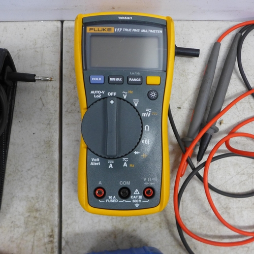 2075 - A Fluke 115 True-RSM Digital multi meter, a Sealey 7 function multi-meter, a Draper Expert digital a... 