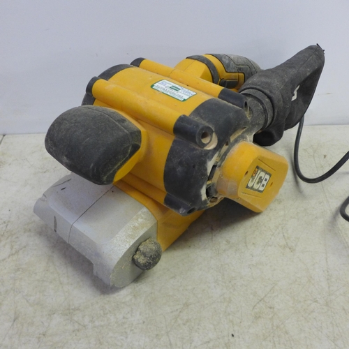 2094 - Two JCB tools including a JCB-BS950 240v 950W belt sander with spare sanding belts and a JCB-R S110 ... 