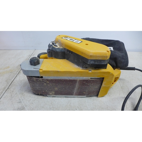 2094 - Two JCB tools including a JCB-BS950 240v 950W belt sander with spare sanding belts and a JCB-R S110 ... 