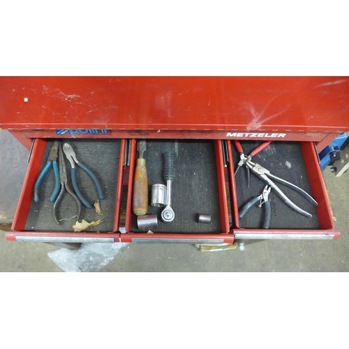 2096 - A Metzeler Maxis metal 6 drawer toolbox with a quantity of tools including pliers, sockets, screwdri... 