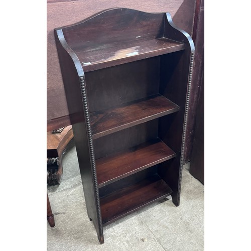 154 - An early 20 Century oak open bookcase