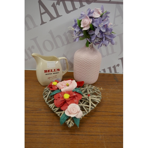 2181 - Assorted decorative items including a Wade Bells Scotch whisky jug, a vase with artificial flowers a... 