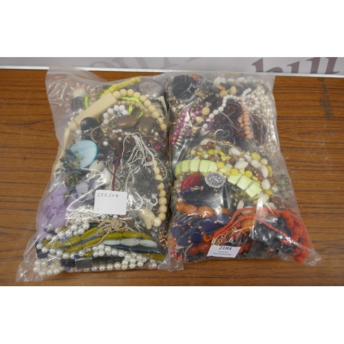 2184 - Two bags of costume jewellery