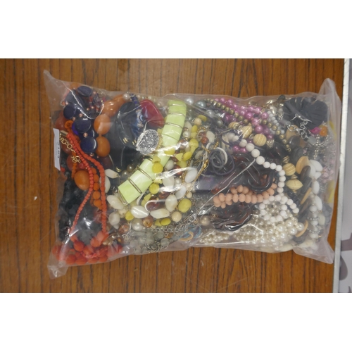 2184 - Two bags of costume jewellery