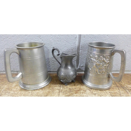 1008 - Two wall pockets, brassware, an Eastern coffee pot and two mugs **PLEASE NOTE THIS LOT IS NOT ELIGIB... 