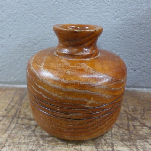 1020 - A carved wooden slide, small table and a wooden bowl