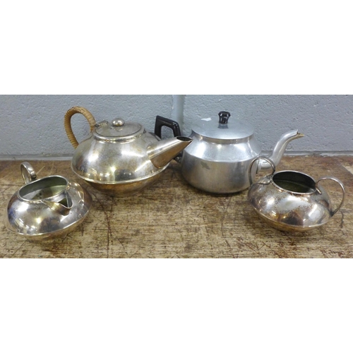 1022 - A collection of plated ware, including three piece tea service, two goblets, copper kettle, etc. **P... 