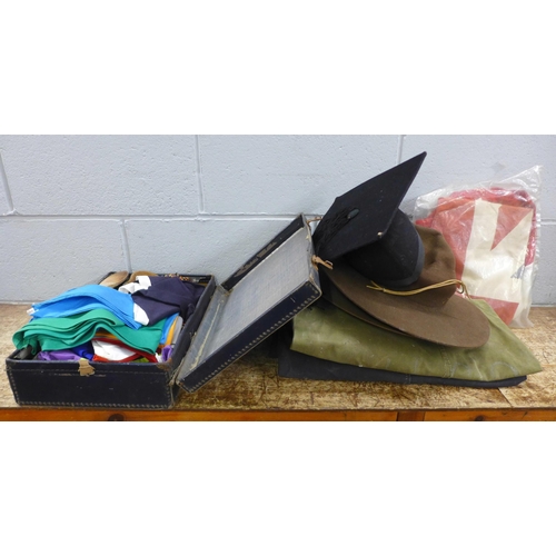 1029 - A collection of Boy Scout items, two hats, belts, neckerchiefs, lanyards, two kit bags, a beret, a U... 