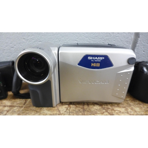 1034 - A quantity of video cameras and older digital cameras **PLEASE NOTE THIS LOT IS NOT ELIGIBLE FOR IN-... 