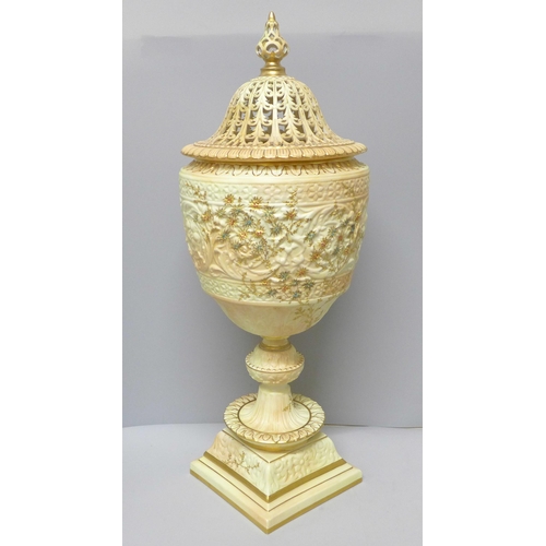 610 - A Grainger's Royal China Works gilt ivory vase and pierced cover, 19th Century (lid discoloured, res... 