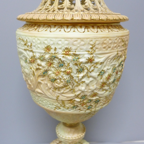 610 - A Grainger's Royal China Works gilt ivory vase and pierced cover, 19th Century (lid discoloured, res... 