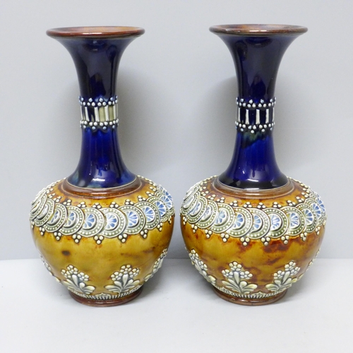 614 - A pair of Doulton Lambeth stoneware vases, impressed marks, 20cm