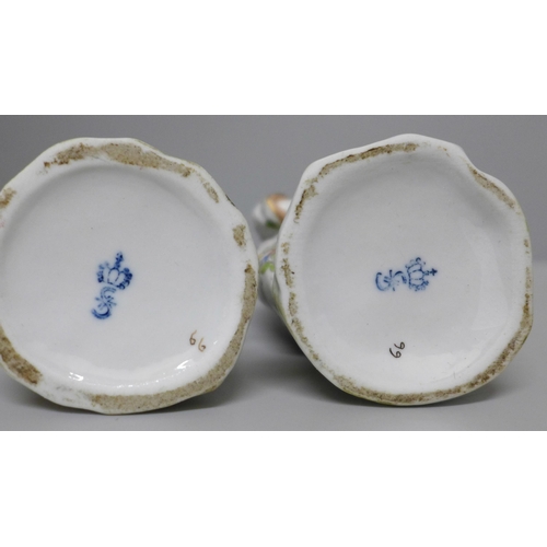 622 - A pair of Sitzendorf continental porcelain figures of ladies, 14.5cm and 15cm