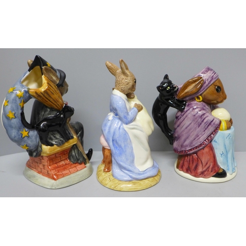 623 - Three Royal Doulton figures of rabbits including two jugs - Witching-Time Bunnykins, Fortune Teller ... 