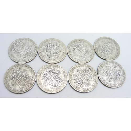 624 - Eight half crowns - 1928 and 1929, 110g together with a pair of plated salts, a pair of small brass ... 