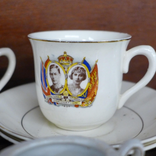 627 - Miniature cups, saucers, teapot and three Royal Commemorative cups and saucers