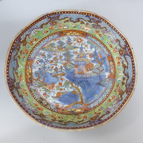 633 - A Chinese porcelain dish, a/f, staple repair, 24cm