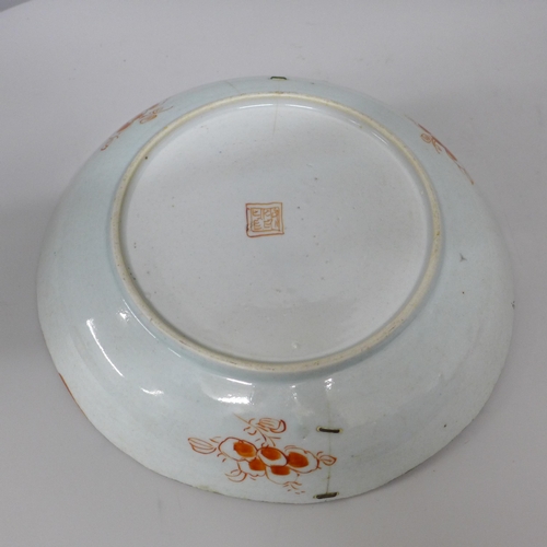 633 - A Chinese porcelain dish, a/f, staple repair, 24cm