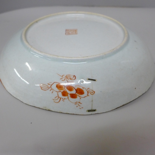 633 - A Chinese porcelain dish, a/f, staple repair, 24cm