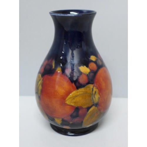 633A - A Moorcroft open pomegranate vase, a/f, chip to base, 12cm