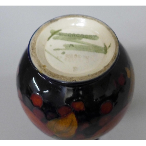 633A - A Moorcroft open pomegranate vase, a/f, chip to base, 12cm