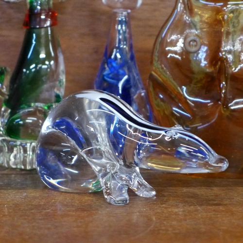 639 - Eight glass models of animals; dogs, cat, badger, owl, etc.