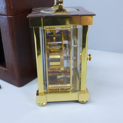 640 - A Matthew Norman London brass and four glass sided carriage clock in a fitted case, with key