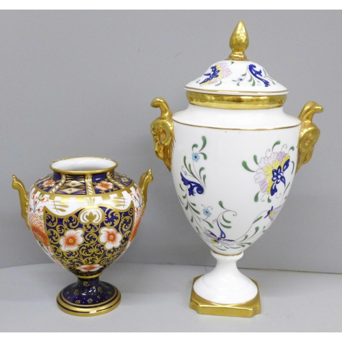 643 - A Royal Crown Derby 1227 shape Imari vase, lacking cover and a Coalport Pageant lidded vase, 21.5cm