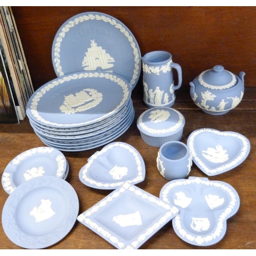 661 - A collection of Wedgwood Jasperware porcelain comprising nine Christmas plates, seven trinket dishes... 