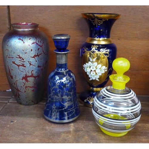 674 - Four pieces of glassware including a Royal Brierley iridescent vase