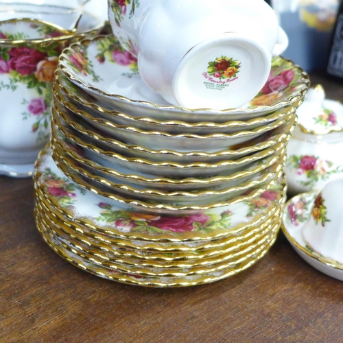 679 - Royal Albert Old Country Roses teawares, etc., six  setting plus additional saucers and a cake stand