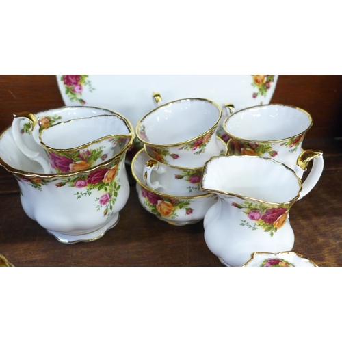 679 - Royal Albert Old Country Roses teawares, etc., six  setting plus additional saucers and a cake stand