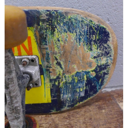 750 - A 1980s skateboard with Venture skateboard trucks