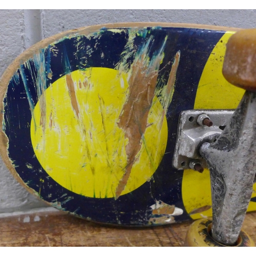 750 - A 1980s skateboard with Venture skateboard trucks