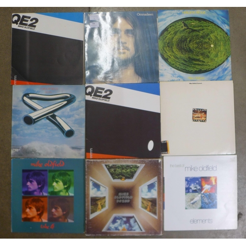 755 - Eleven LP records, Mike Oldfield, Yes, a Mike Oldfield Elements CD set and some rock n roll LP recor... 