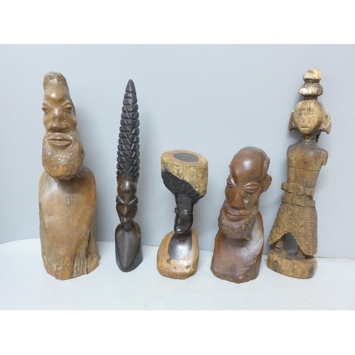 784 - Five African carved wooden figures