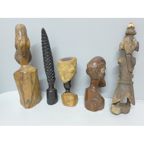 784 - Five African carved wooden figures