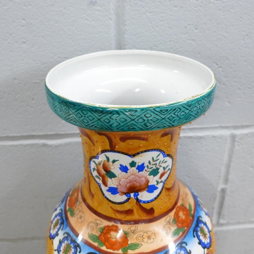 794 - A large Oriental temple vase, 60cm