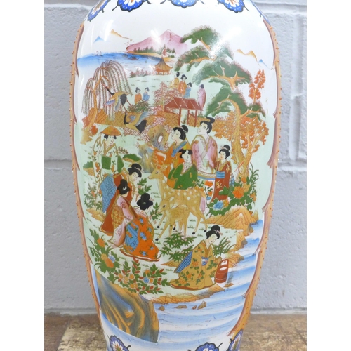 794 - A large Oriental temple vase, 60cm