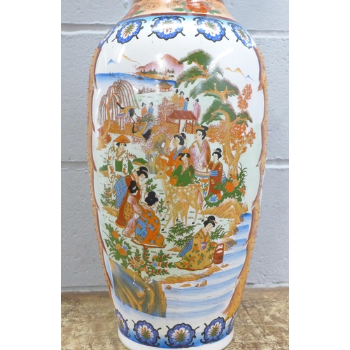 794 - A large Oriental temple vase, 60cm