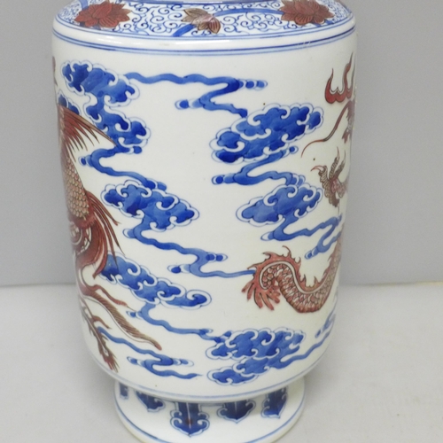 795 - A Chinese porcelain vase with dragon and cloud detail, six character mark to base, 34.5cm