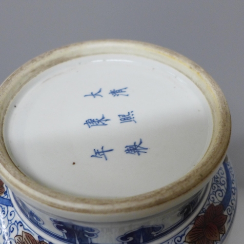 795 - A Chinese porcelain vase with dragon and cloud detail, six character mark to base, 34.5cm