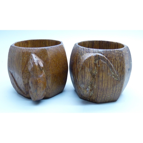 802 - Two carved oak Mouseman napkin rings