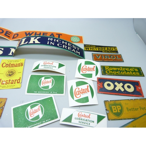 803 - A collection of Bassett-Lowke mid-20th Century model rail tin-plate advertising signs and some paper... 