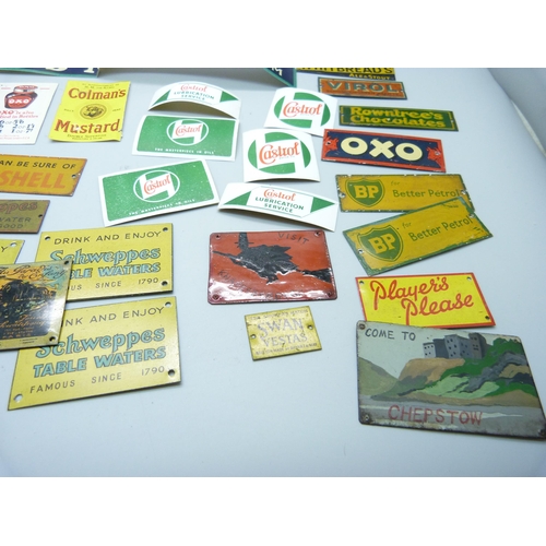 803 - A collection of Bassett-Lowke mid-20th Century model rail tin-plate advertising signs and some paper... 