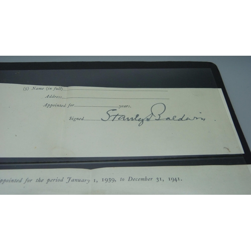 807 - Two paper slips signed by Stanley Baldwin and Baldwin of Bewdley together with a handwritten envelop... 